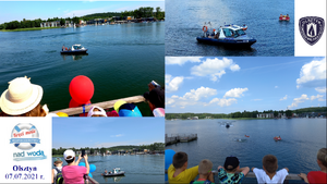 Zdjęcie przedstawia uczestników spotkania profilaktycznego nad jeziorem Ukiel z umudurowanymi policjantkami.