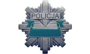 Zdjęcie przedstawia odznakę policyjną.