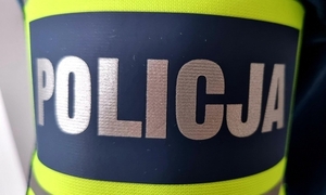 Zdjęcie przedstawia napis "Policja"